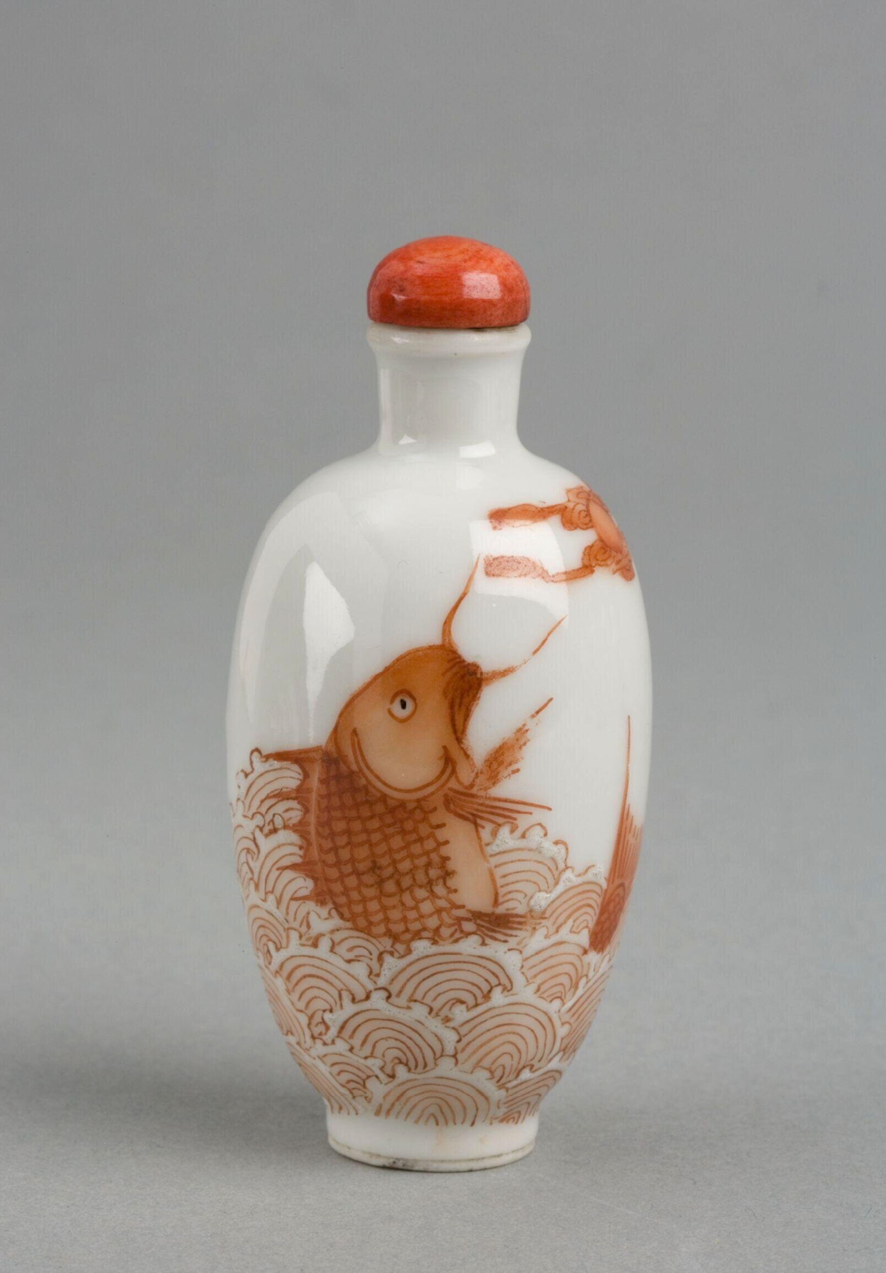 Porcelain with catfish in waves and moon