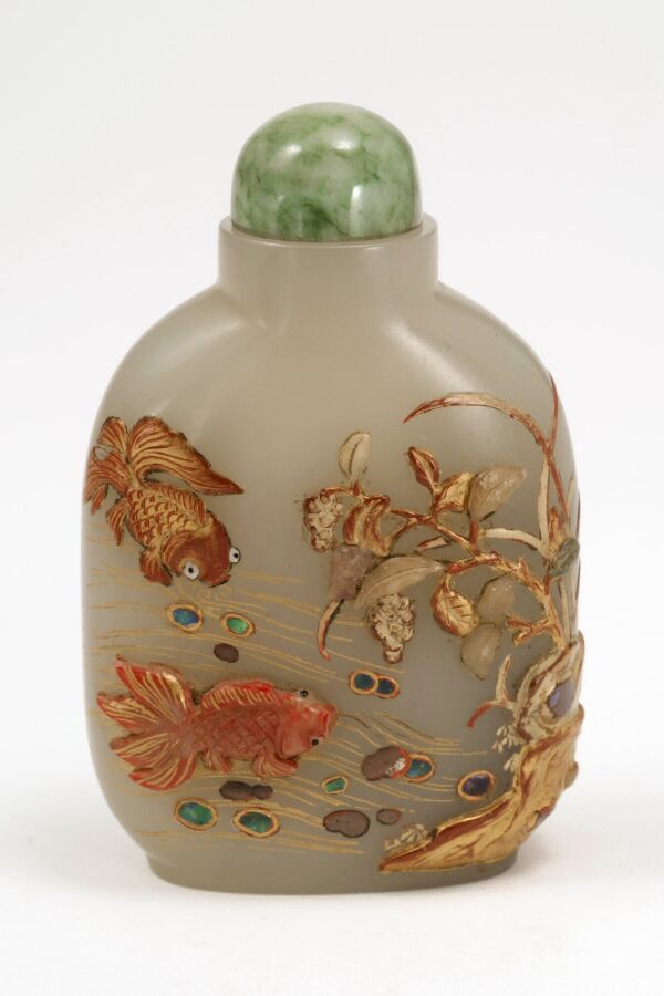 White nephrite carved with goldfish, plants, and poem