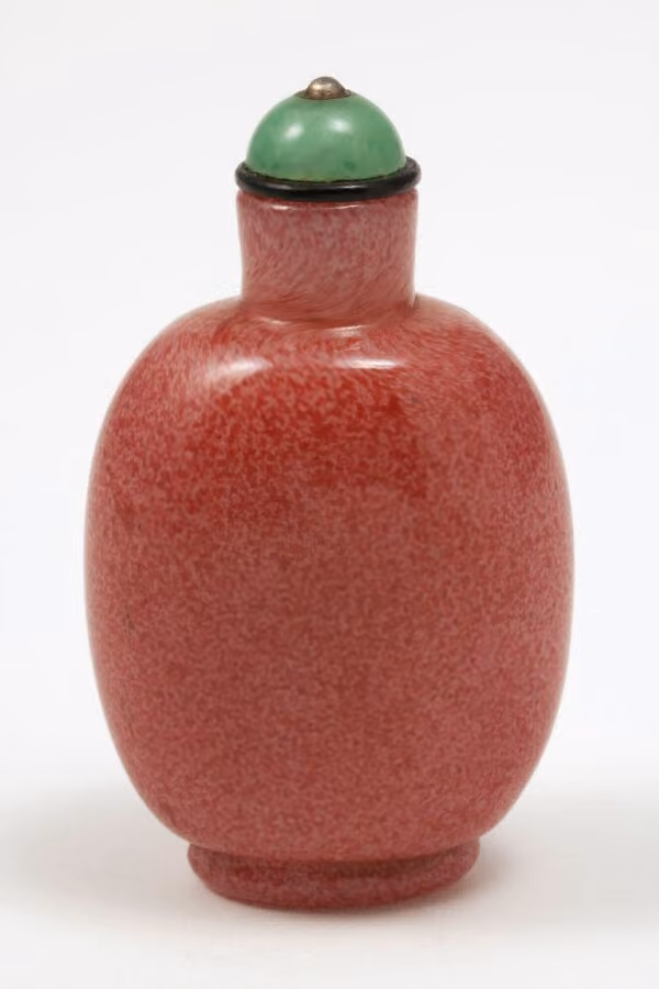 Mottled pink glass flask