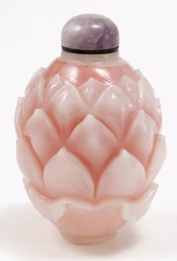 Pink and white glass with lotus blossom
