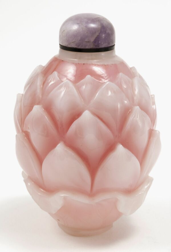 Pink and white glass with lotus blossom