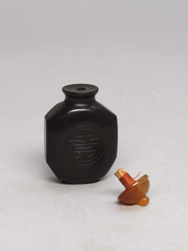 Smoky crystal carved with roundel shou character