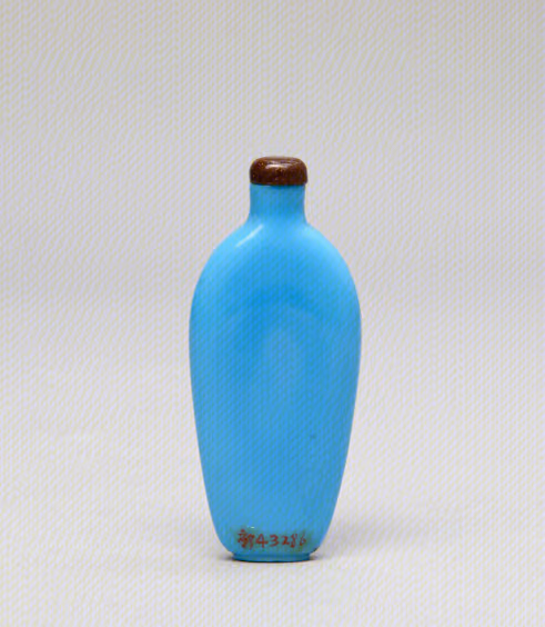 Plain sky-blue glass of oval form