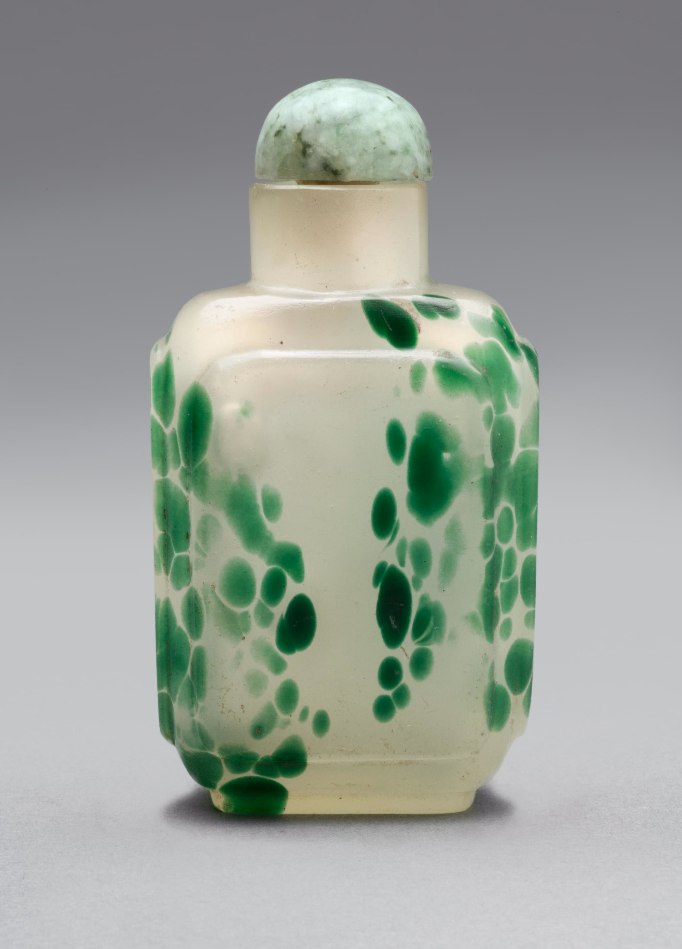 Mottled green on white glass of rectangular form