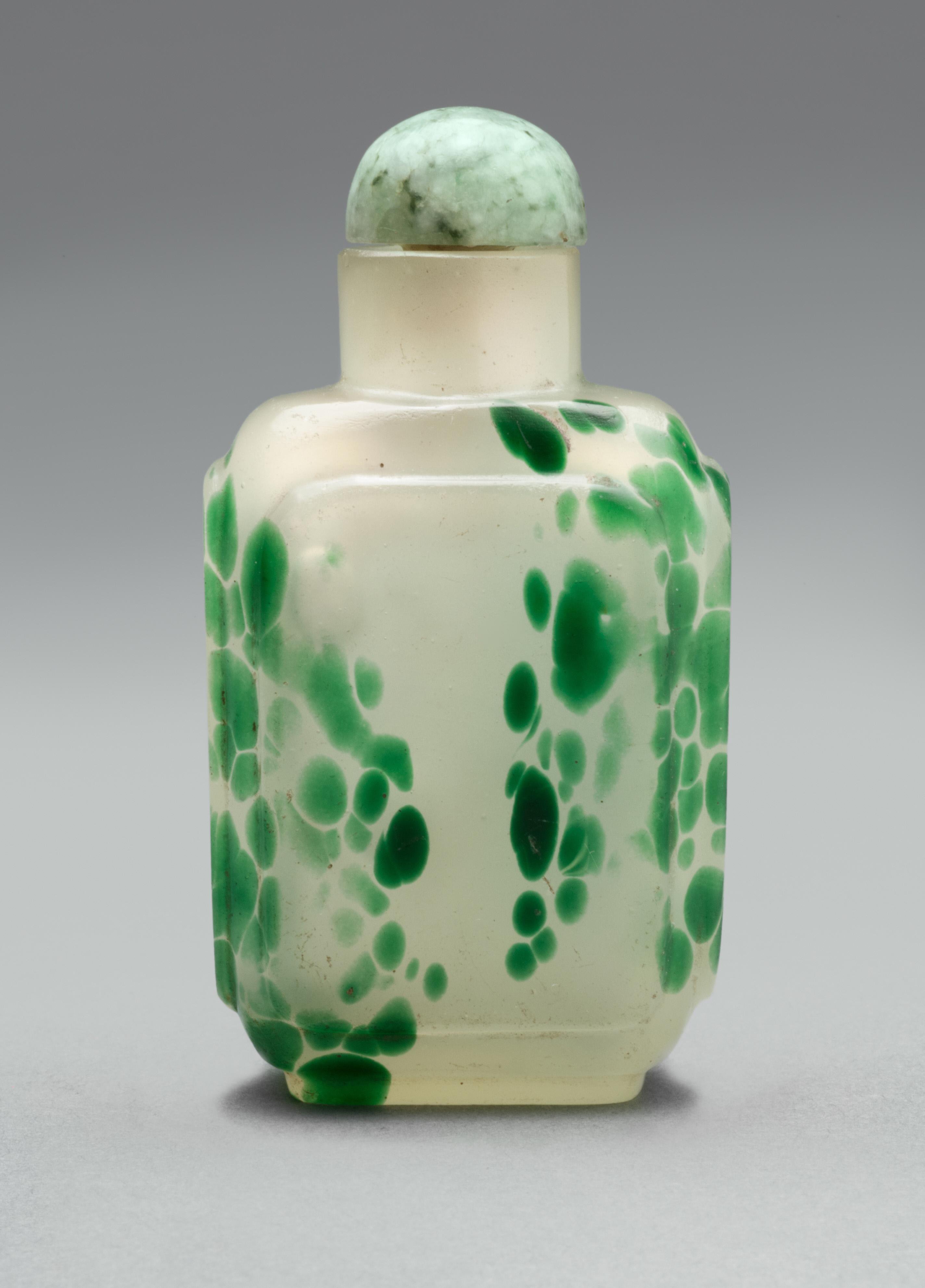 Mottled green on white glass of rectangular form