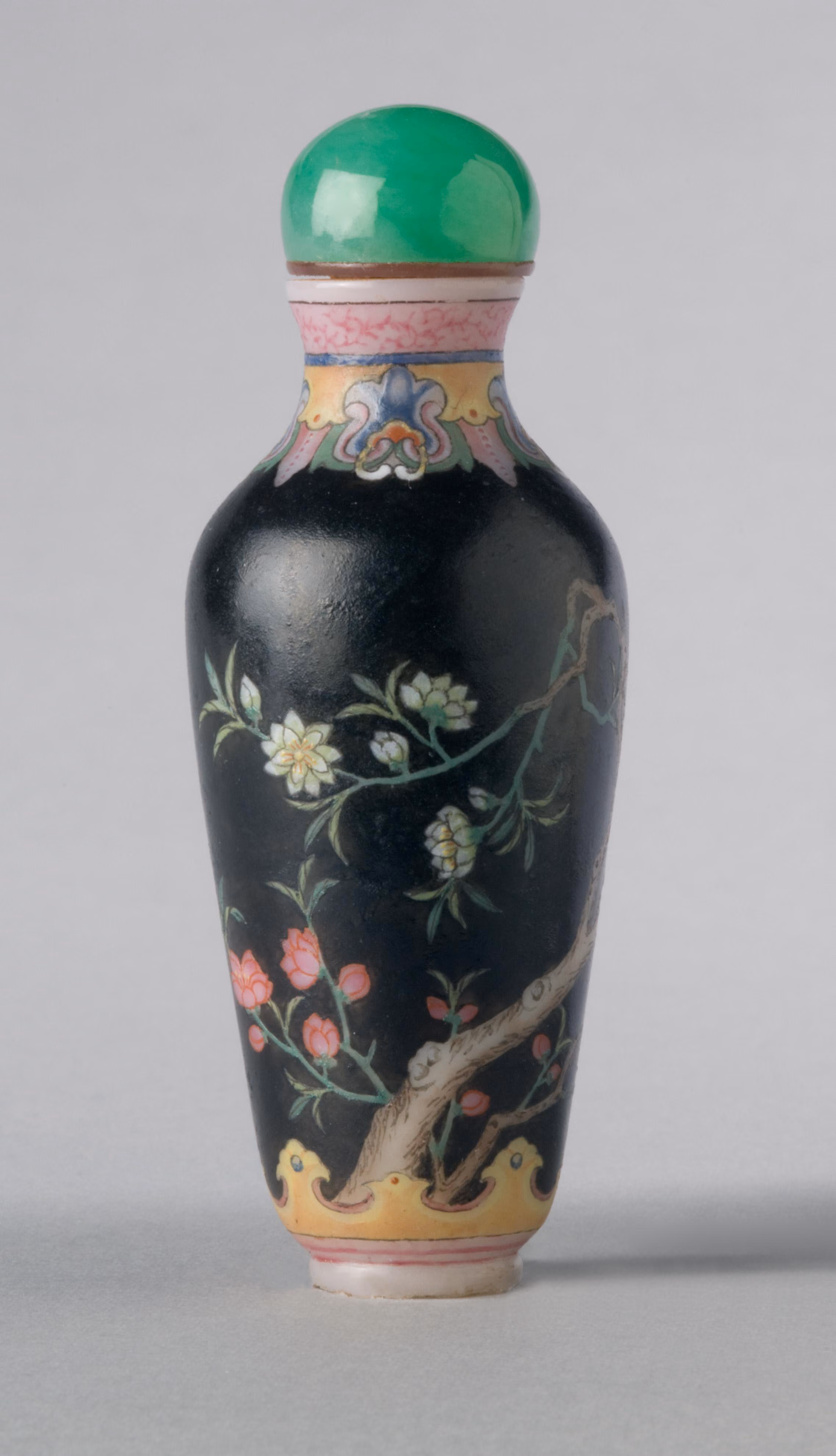 Famille noire enamelled glass with flowering tree