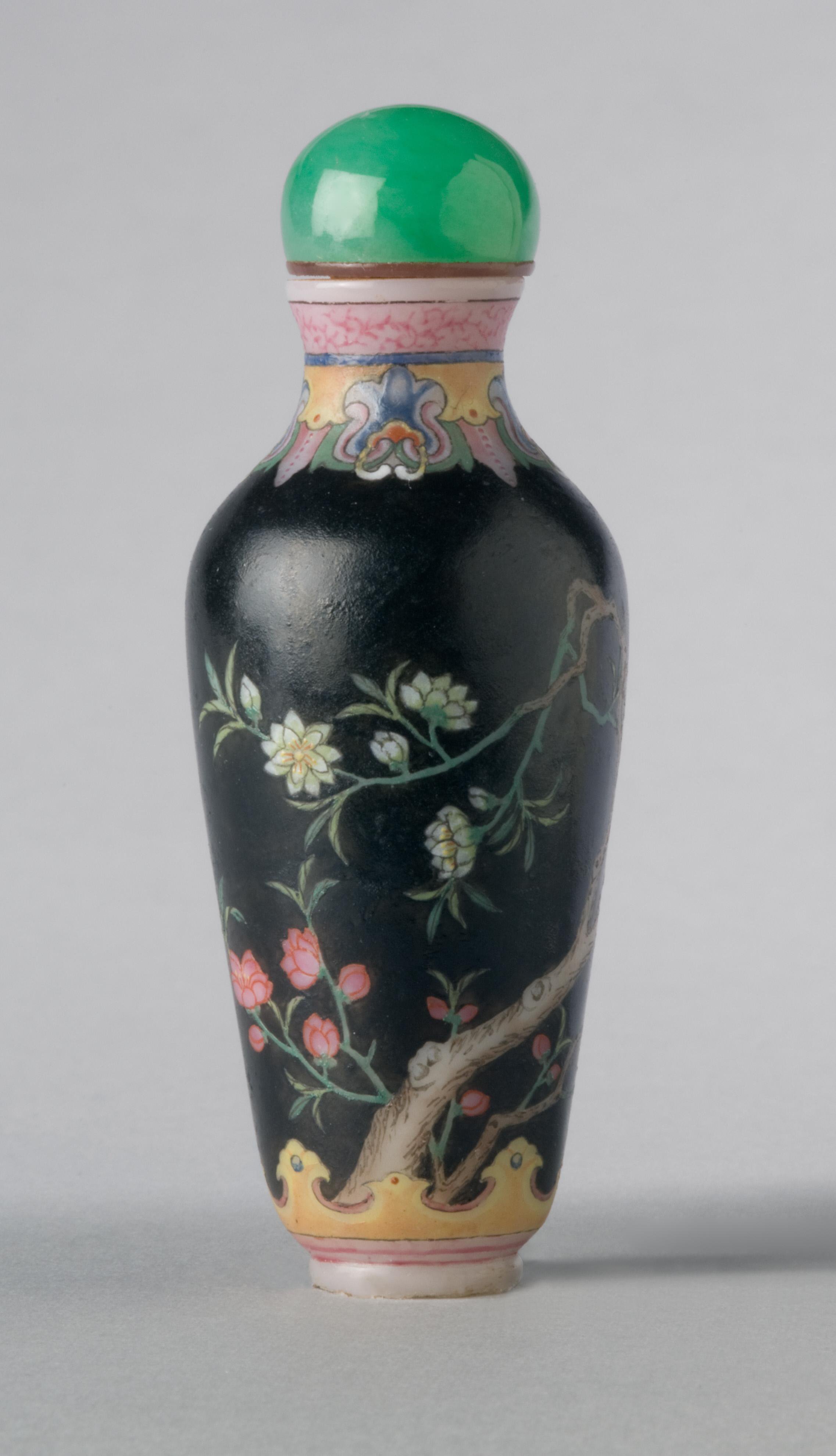 Famille noire enamelled glass with flowering tree
