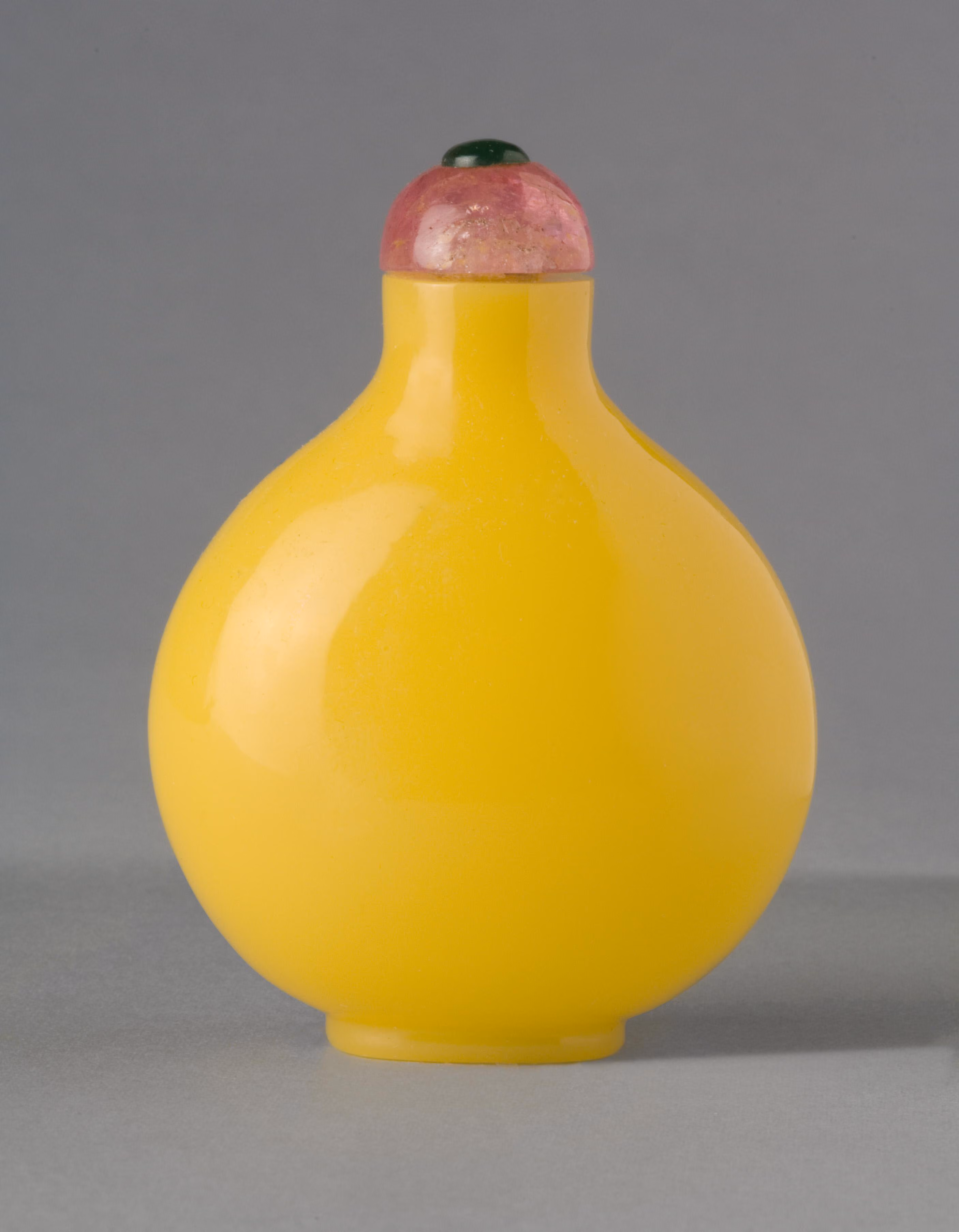 Opaque yellow glass of spade form