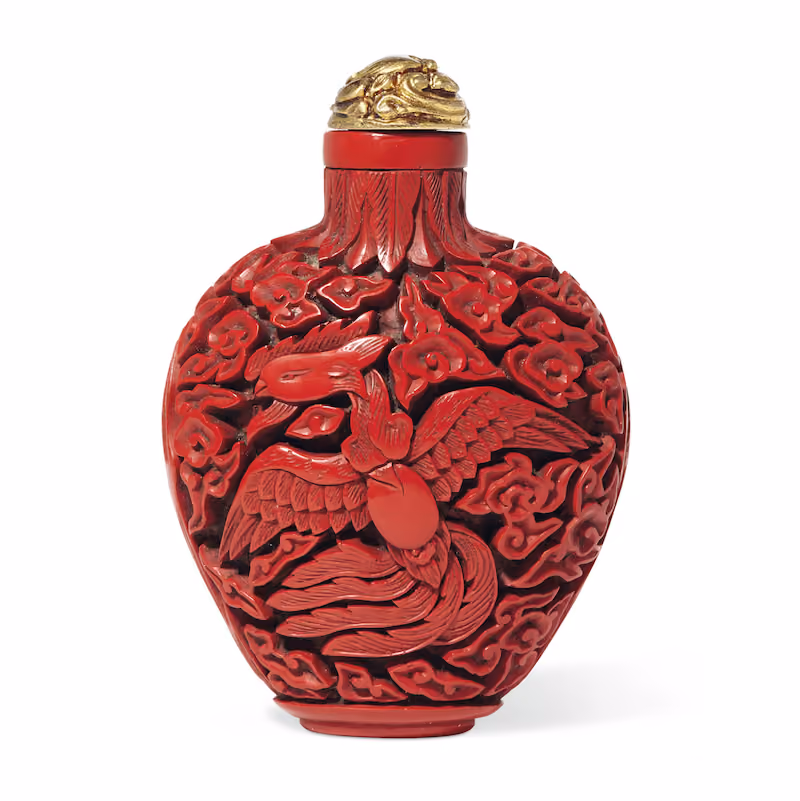 Cinnabar snuff bottle depicting fenghuang
