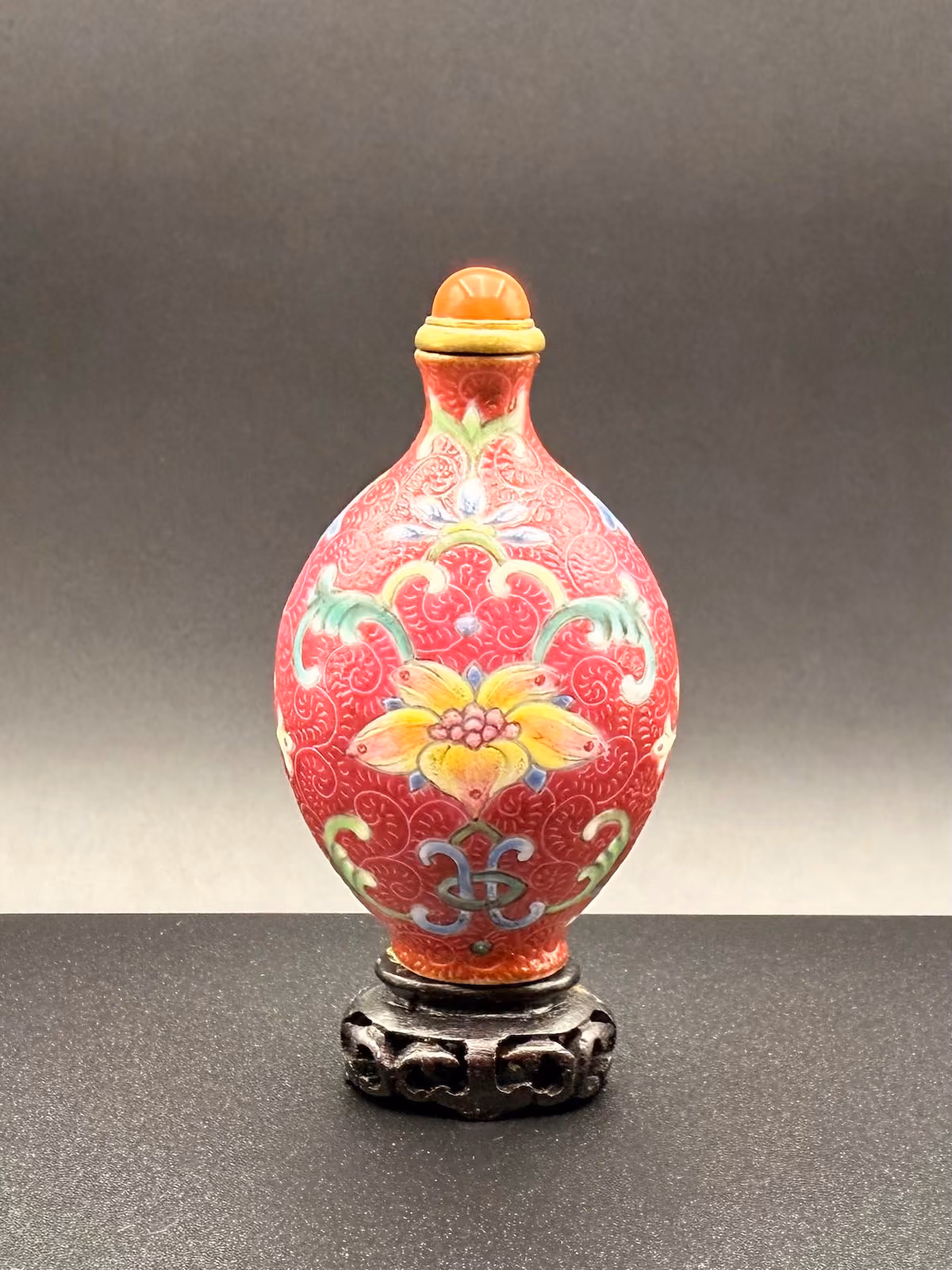Porcelain with rose du Barry glaze and famille-rose flowers