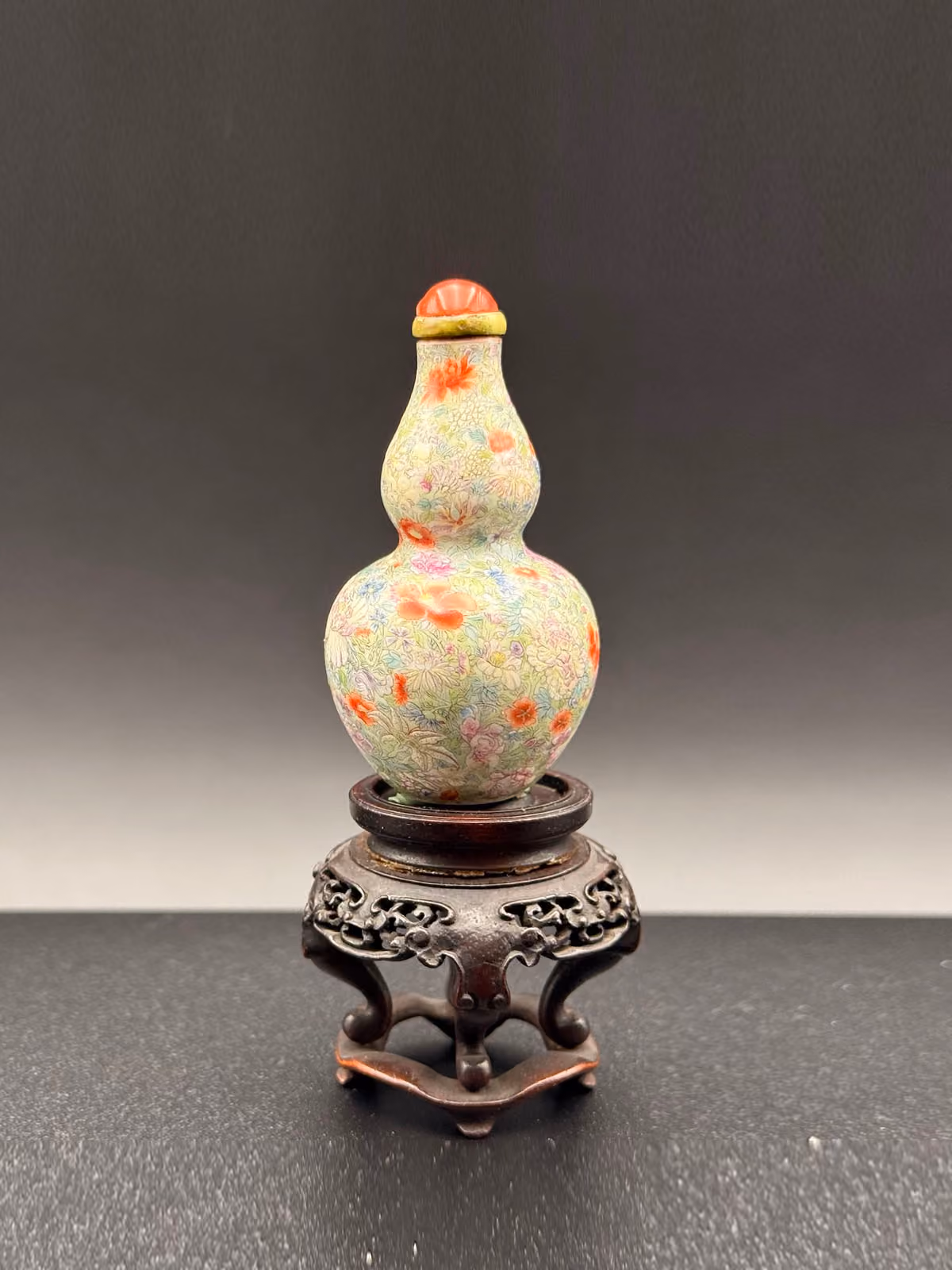 Famille-rose porcelain in double gourd form with millefleurs design