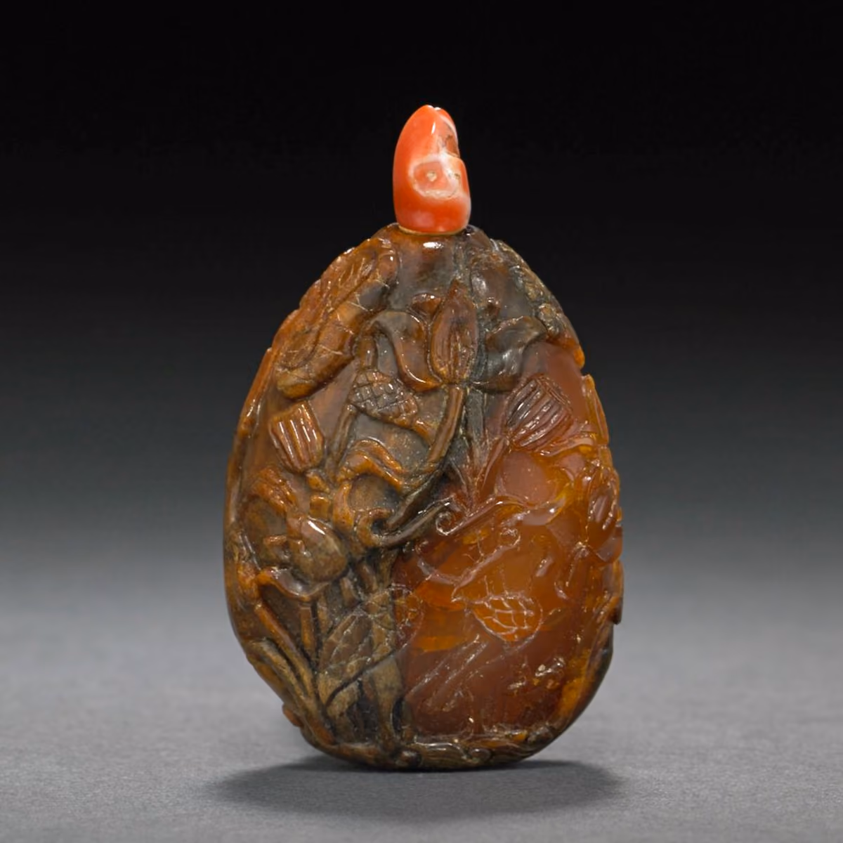 Root amber snuff bottle