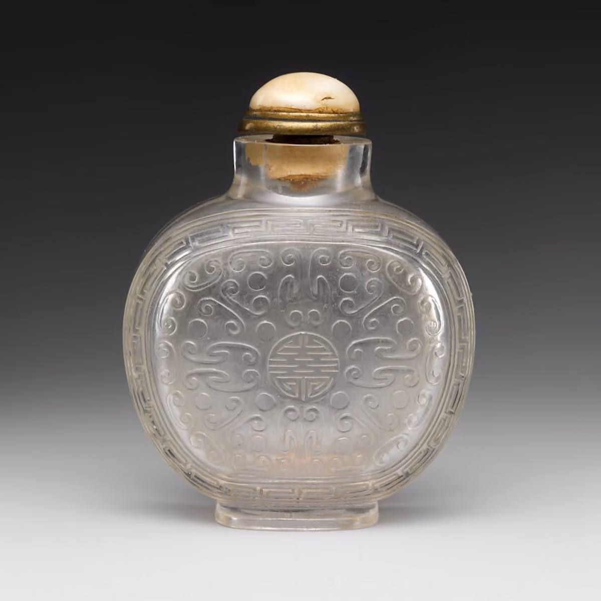 Carved rock crystal snuff bottle with shou character