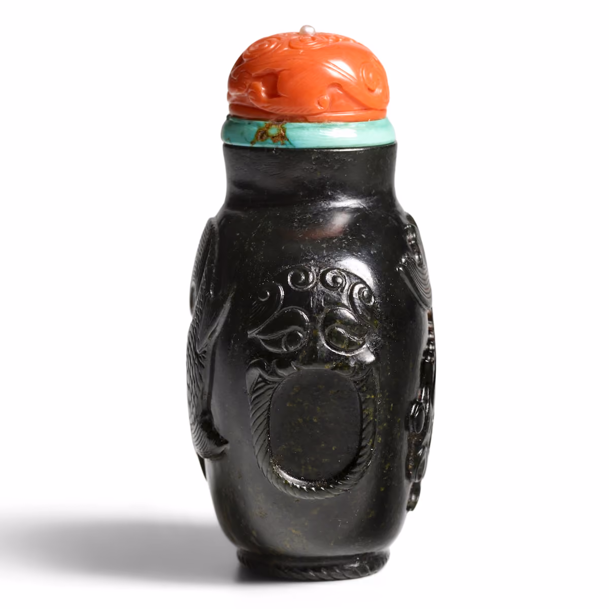 Black jade with snuff bottle taotie masks on shoulders