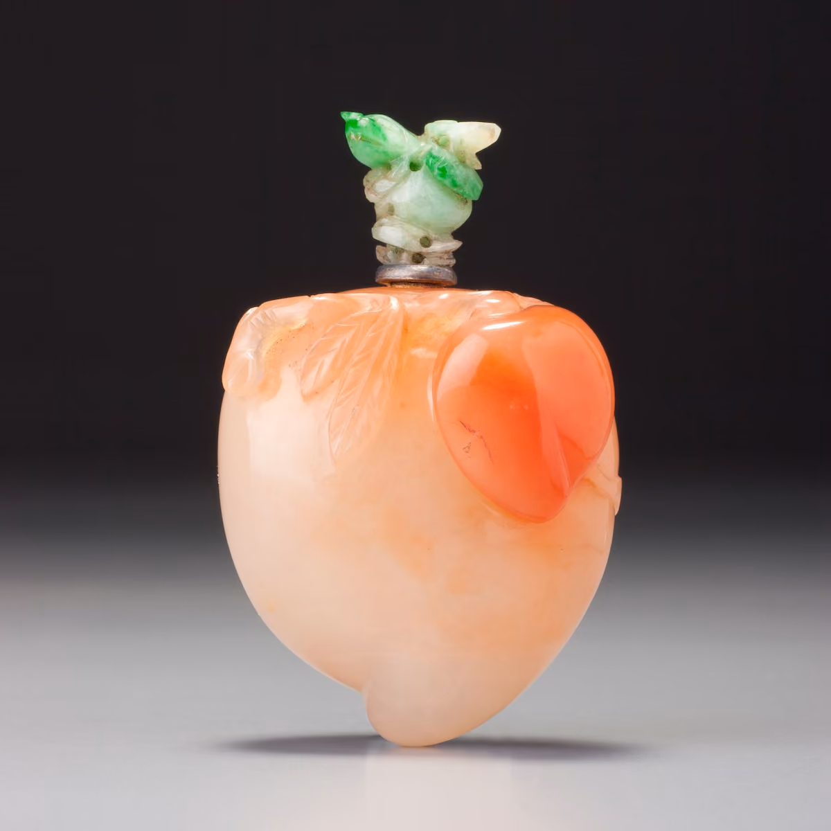 Carnelian snuff bottle in the shape of a peach