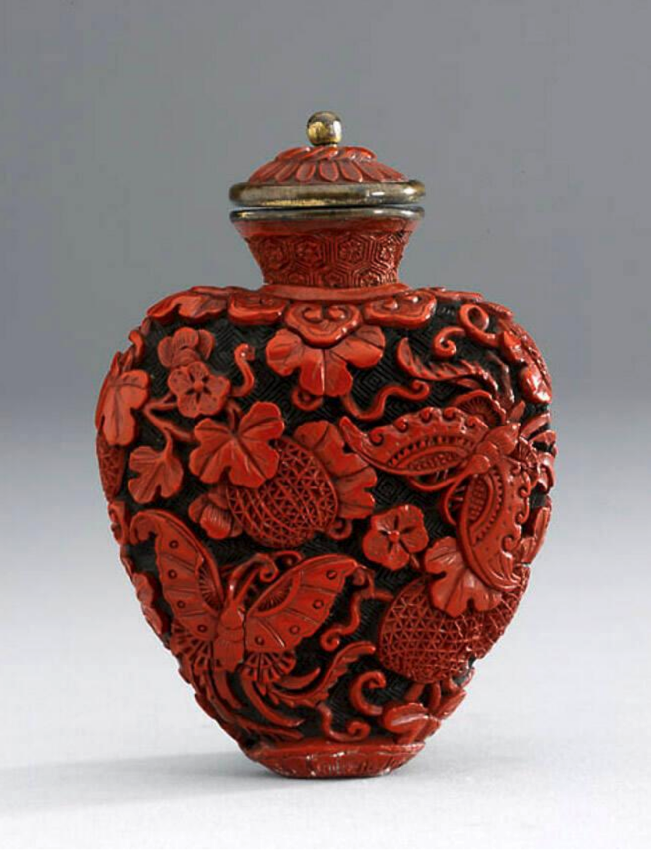 Cinnabar lacquer with butterflies on black lacquer ground