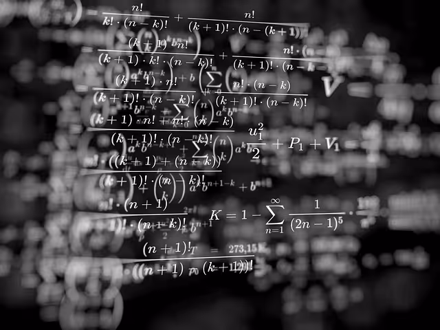 Blackboard filled with complex mathematical formulas and equations in white handwriting.