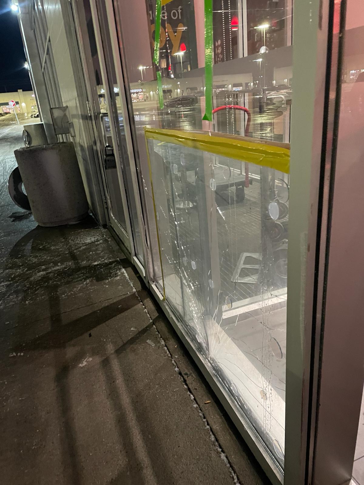 Commercial window patch on storefront glass