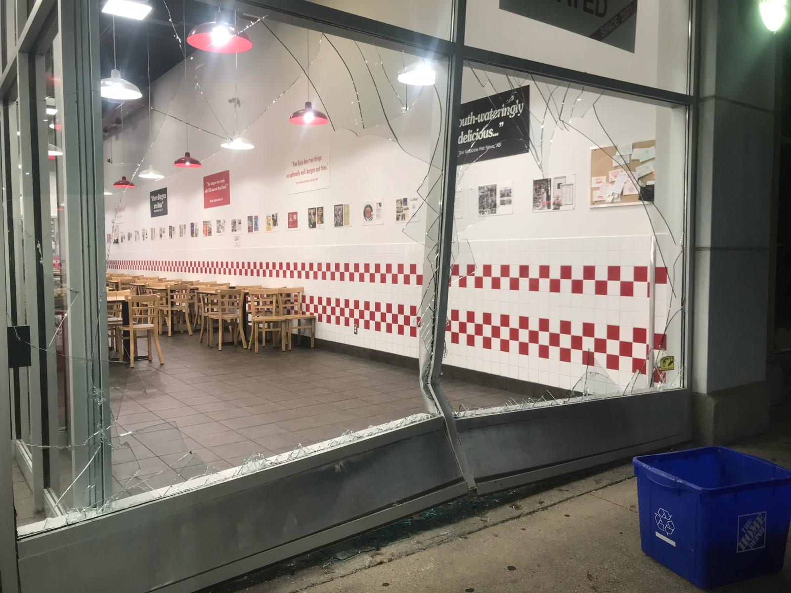 Storefront smashed by car
