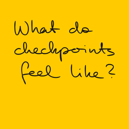 Handwritten text on a yellow background that reads, 'What do checkpoints feel like?'