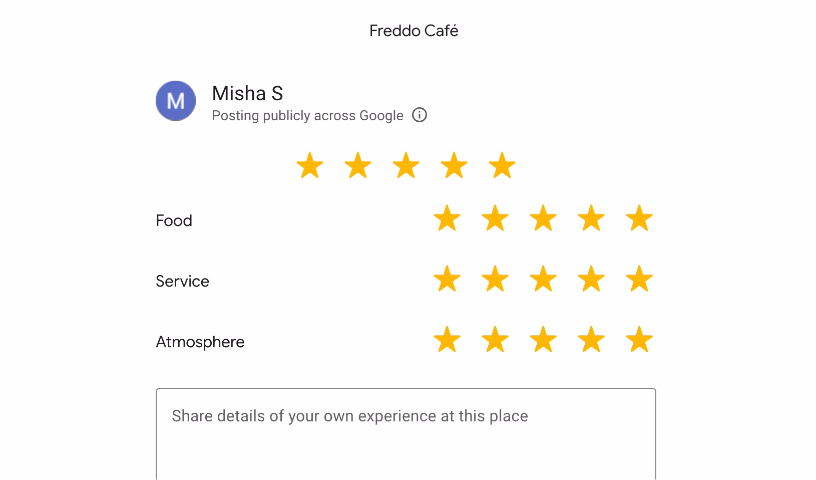 Google review for Freddo Café by Misha S with five-star ratings for overall, food, service, and atmosphere.