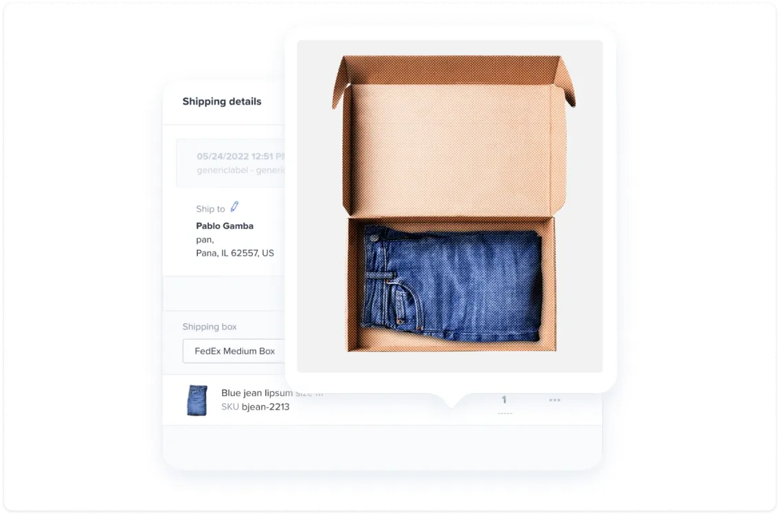 Open cardboard box containing neatly folded blue jeans.