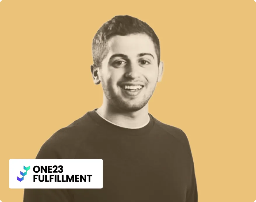 Smiling woman with long hair wearing a denim jacket against a beige background with DFTBA logo in the corner.