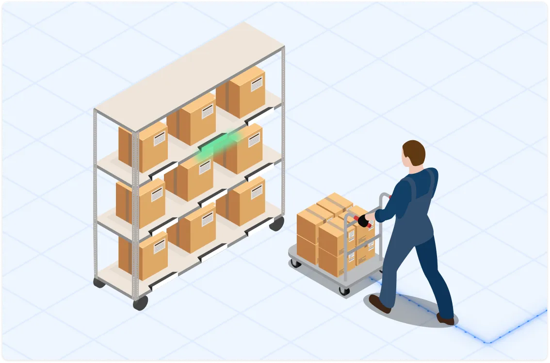 Worker pushing a cart loaded with boxes towards a shelf filled with more boxes in a warehouse setting.