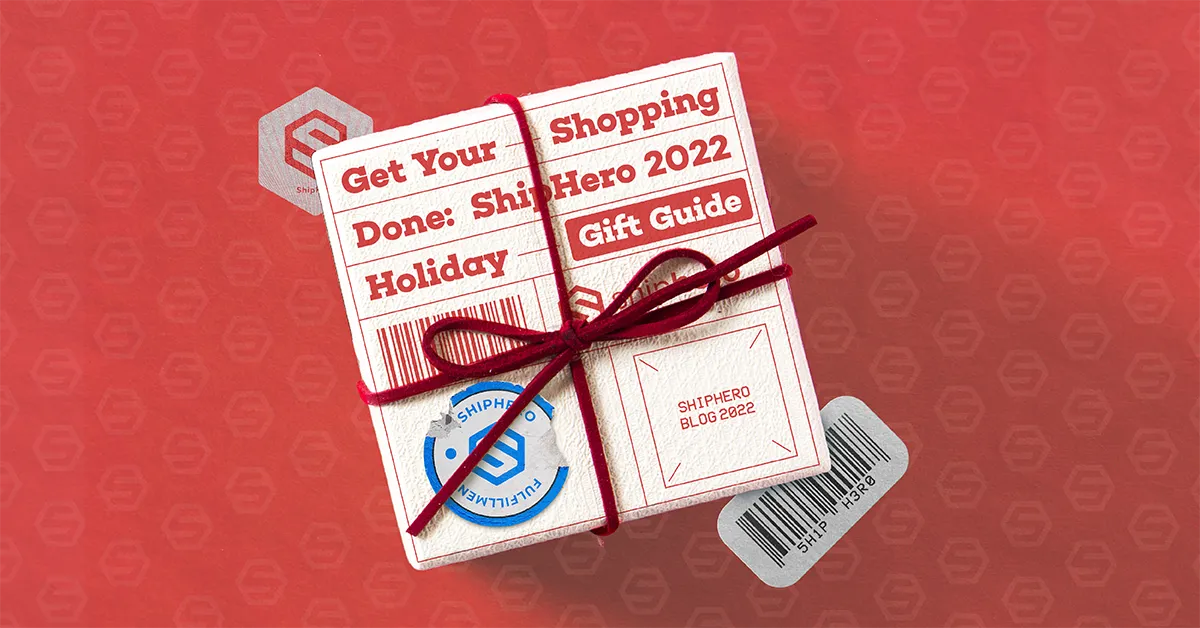 Gift wrapped box with a tag reading Get Your Shopping Done: ShipHero 2022 Holiday Gift Guide on red background.