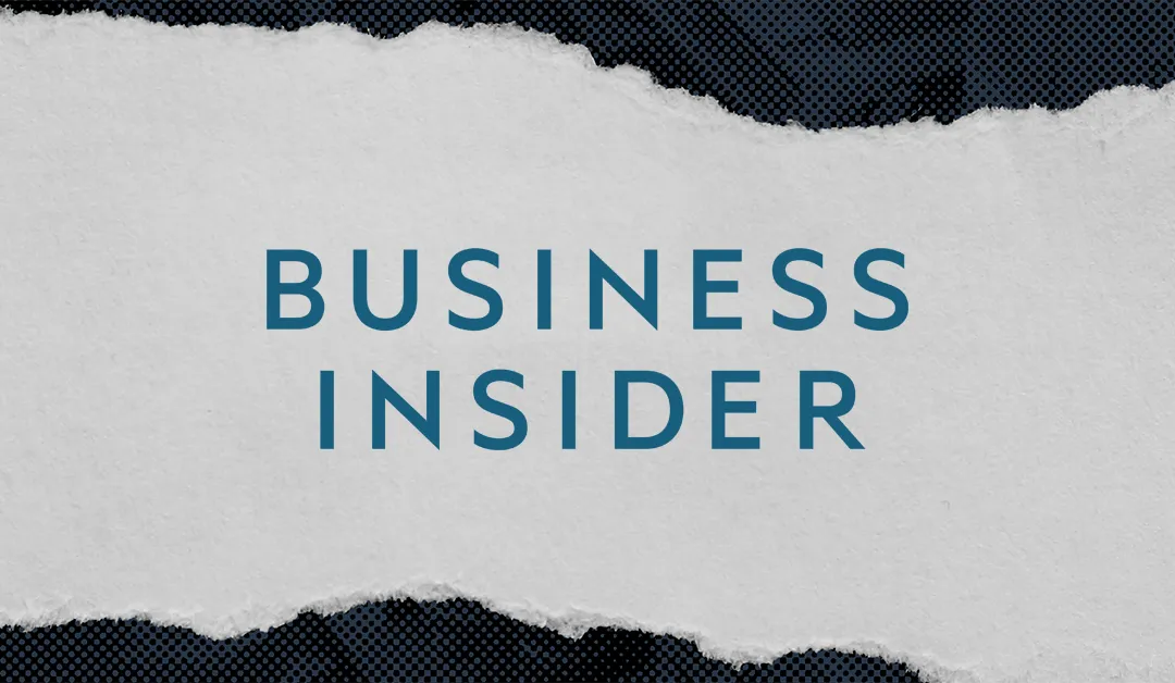 Business Insider text centered on a torn white paper background over dark blue dotted texture.