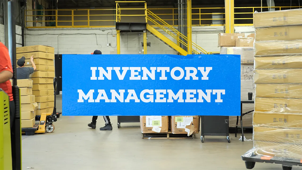 Warehouse scene with workers stacking boxes and a blue banner reading Inventory Management.