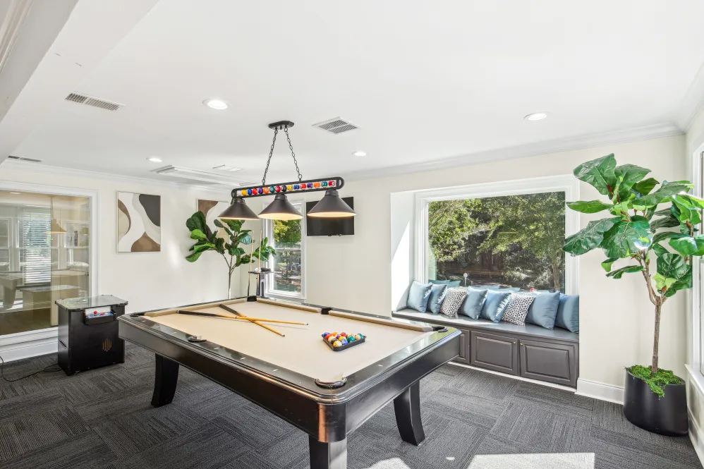 Billiards table with colorful balls on top