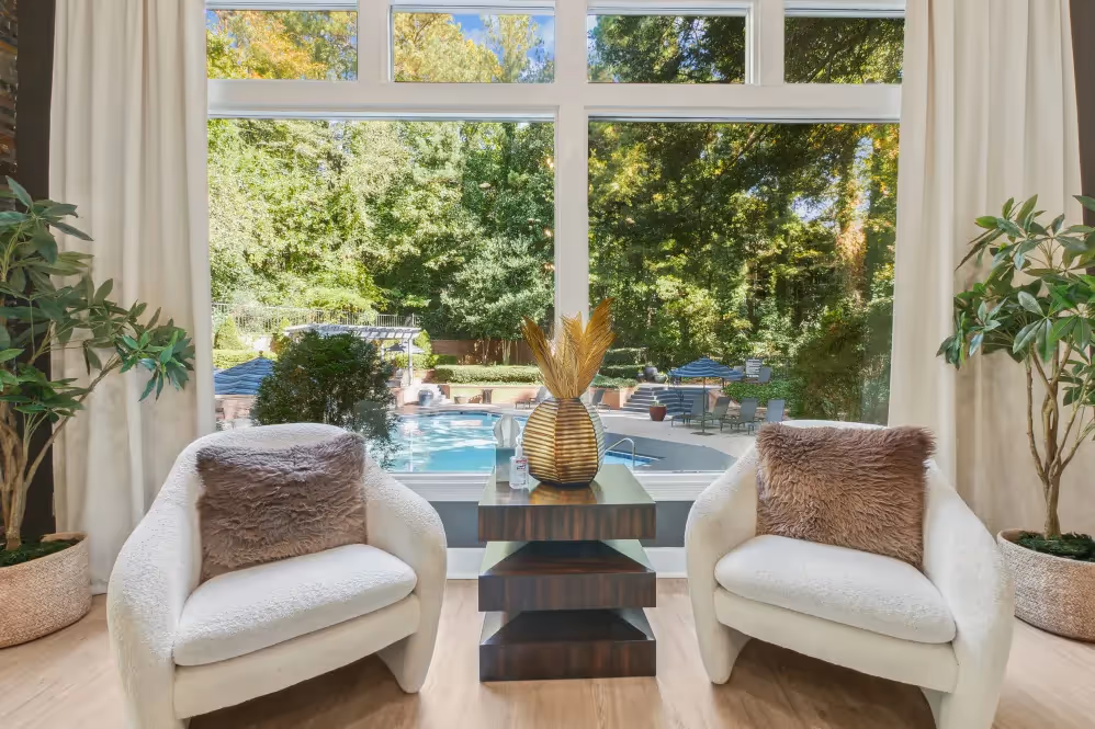 Seating area by large windows