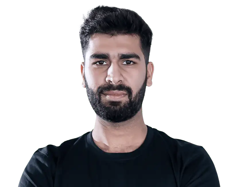 Portrait of a man with dark hair and beard wearing a black shirt against a transparent background.