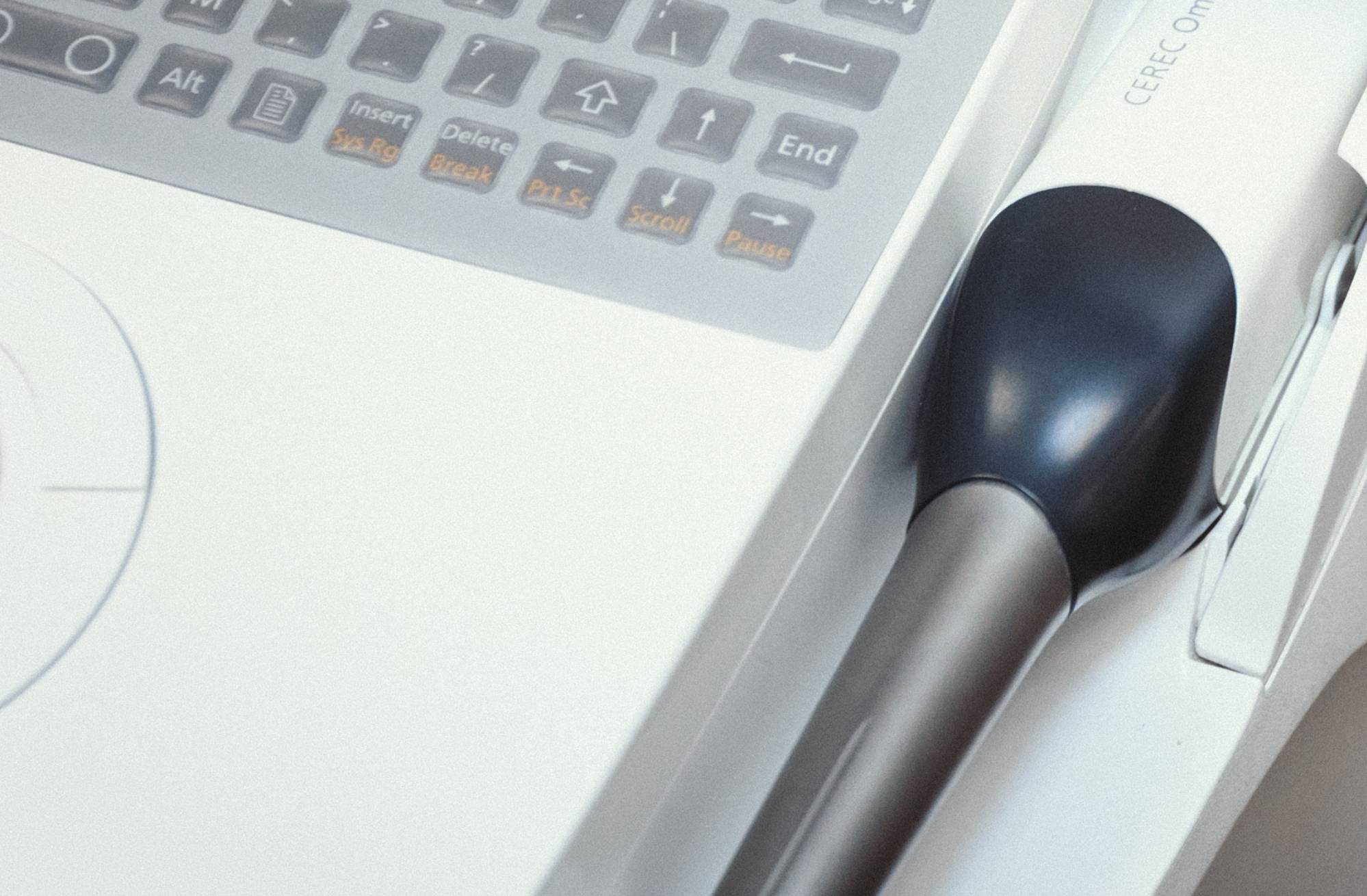 A close-up photo of a 3D dental scanner