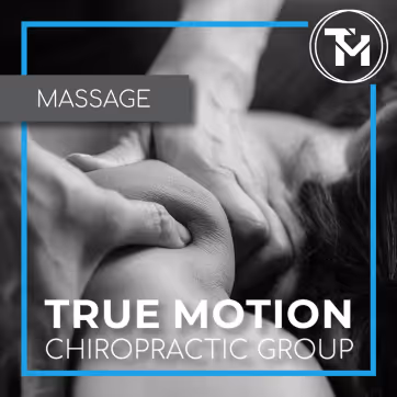 Close-up of hands giving a shoulder massage with text overlay 'Massage True Motion Chiropractic Group' and a circular TM logo.