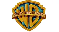 Warner Bros Television logo with gold shield and blue background.