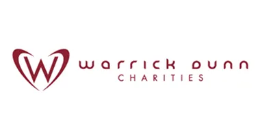 Warrick Dunn Charities logo with stylized 'W' inside a heart shape.
