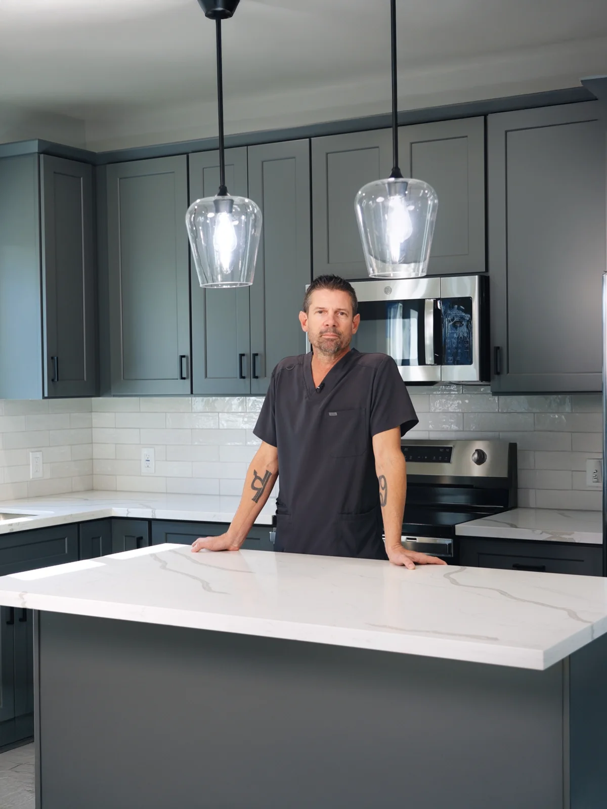 a man standing in a kitchen