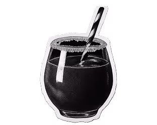 Glass with dark beverage and spoon inside on a black background.
