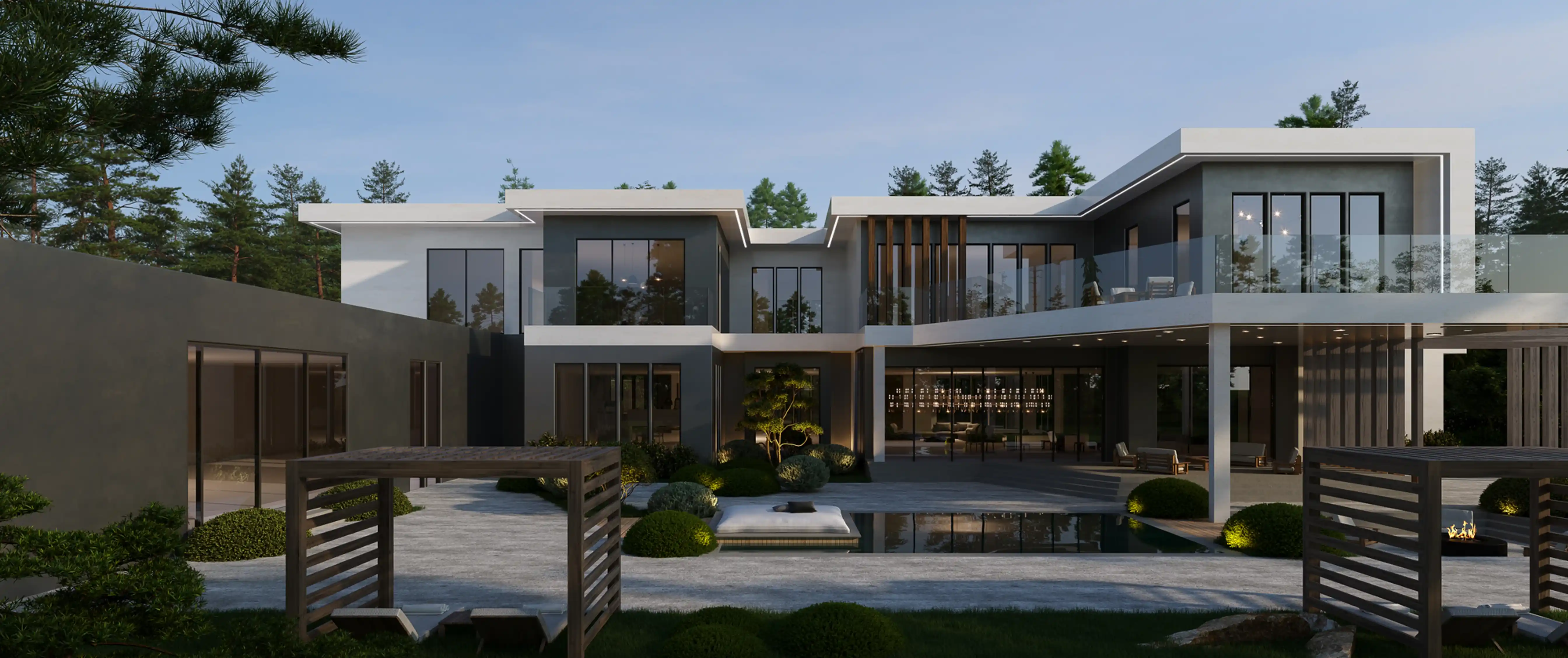 Modern two-story house with large glass windows, outdoor seating area, pool, and surrounding greenery under a clear sky.