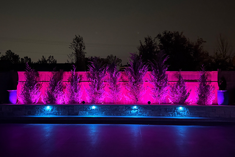 Retaining wall with low voltage landscape lights.