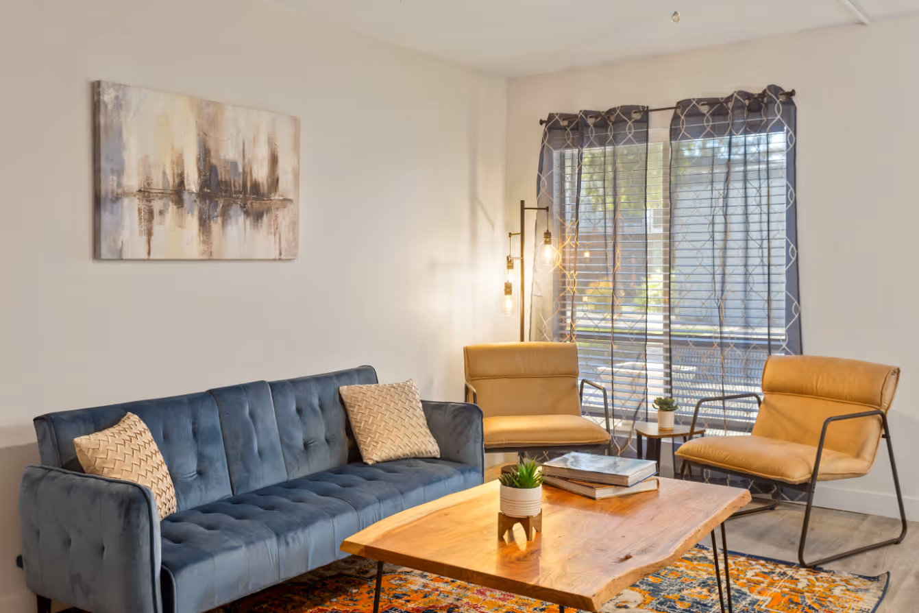 furnished living area with sofa and coffee table