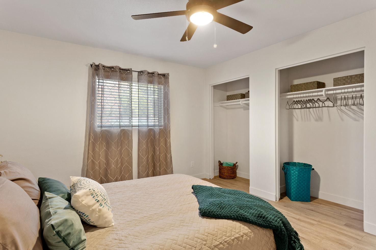bedroom with bed and view of closet