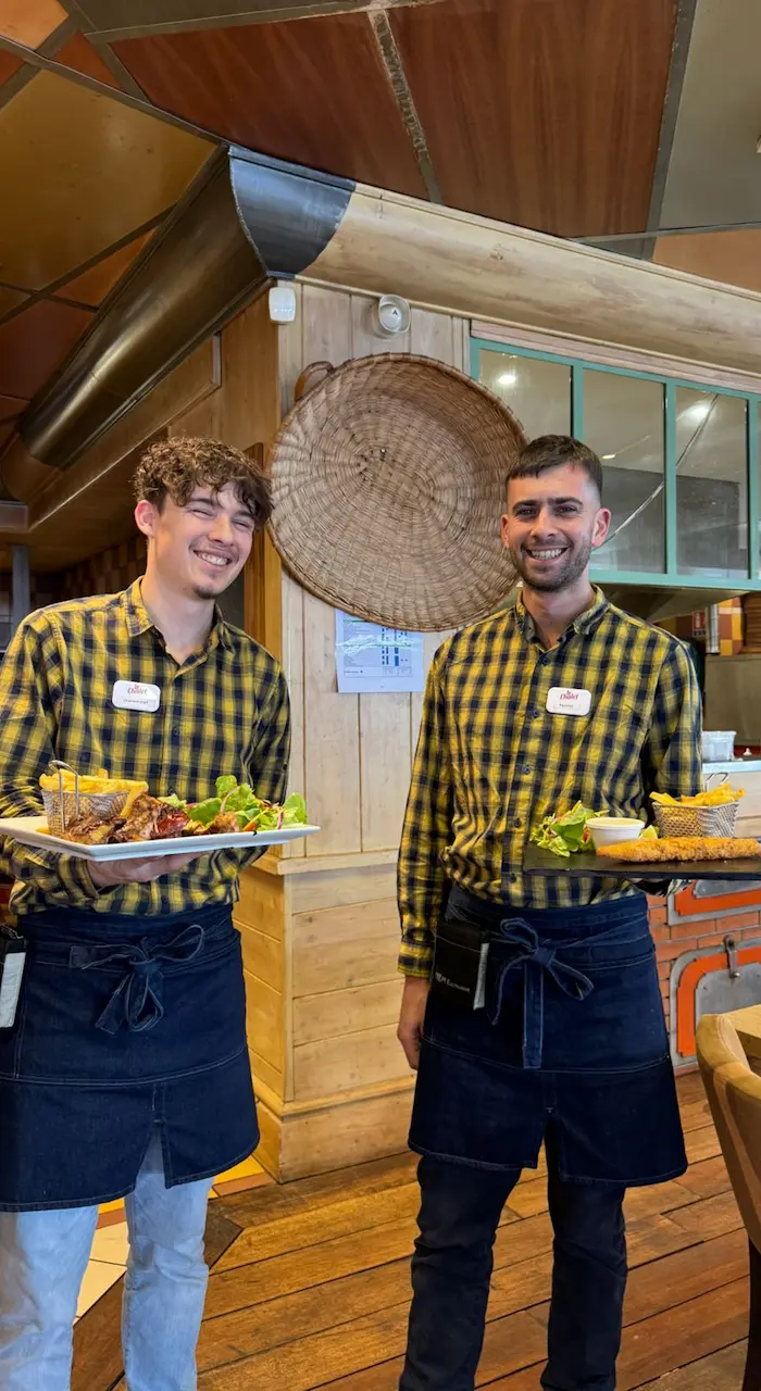 Ham and mushroom pizza on a snowy balcony.
