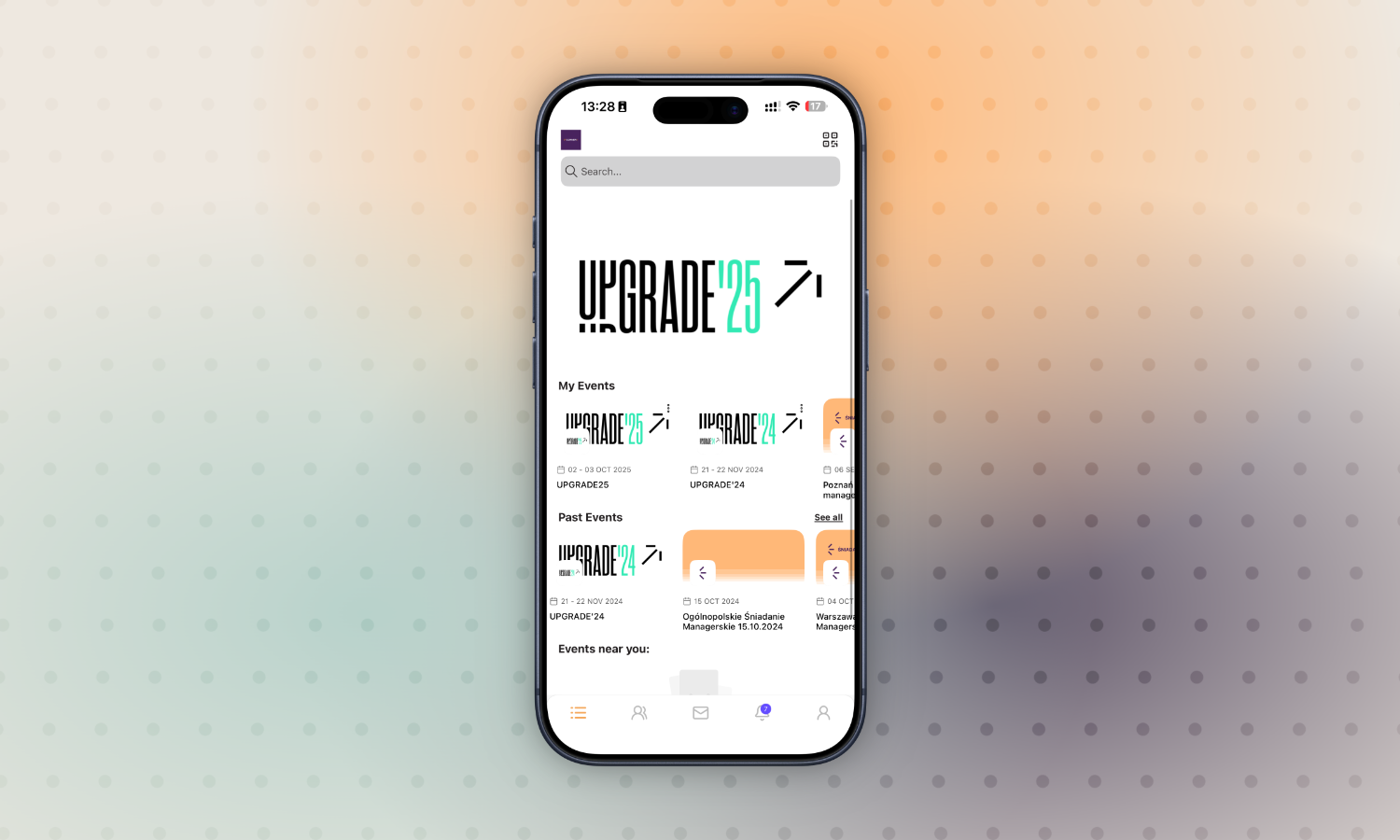 Widok aplikacji mobilnej na smartfonie z listą nadchodzących i przeszłych wydarzeń Upgrade zaplanowanych na lata 2024 i 2025.