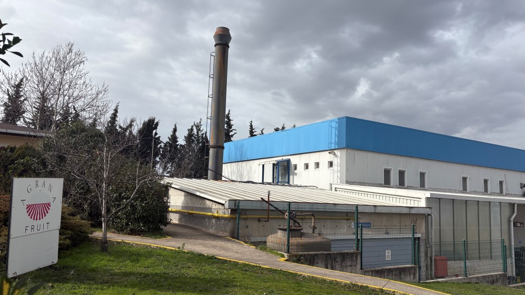 AGRANA Fruit plant in Istanbul, Turkey, white and blue building with chimney and AGRANA Fruit sign