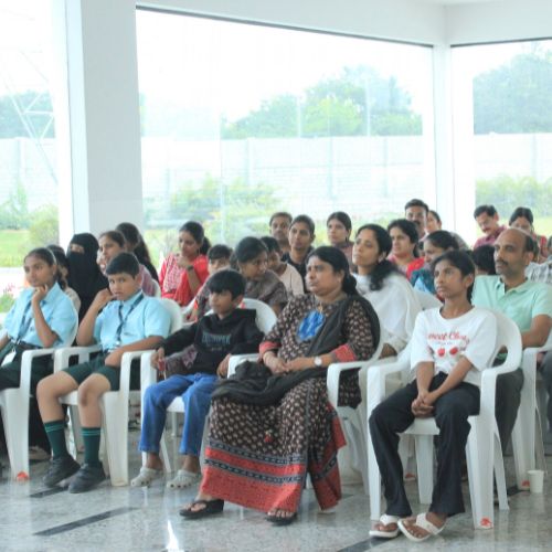 Students and families at a Quantium school event