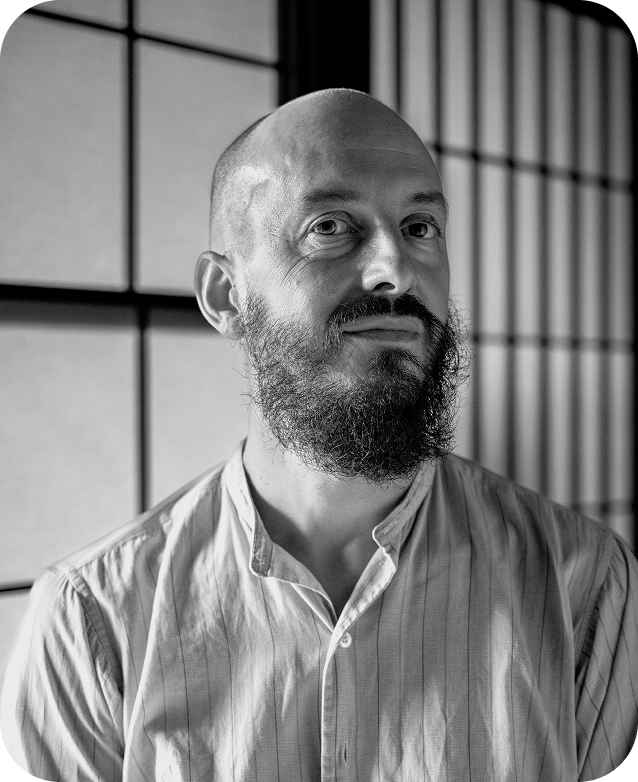 Black and white portrait photo of Julien Michel