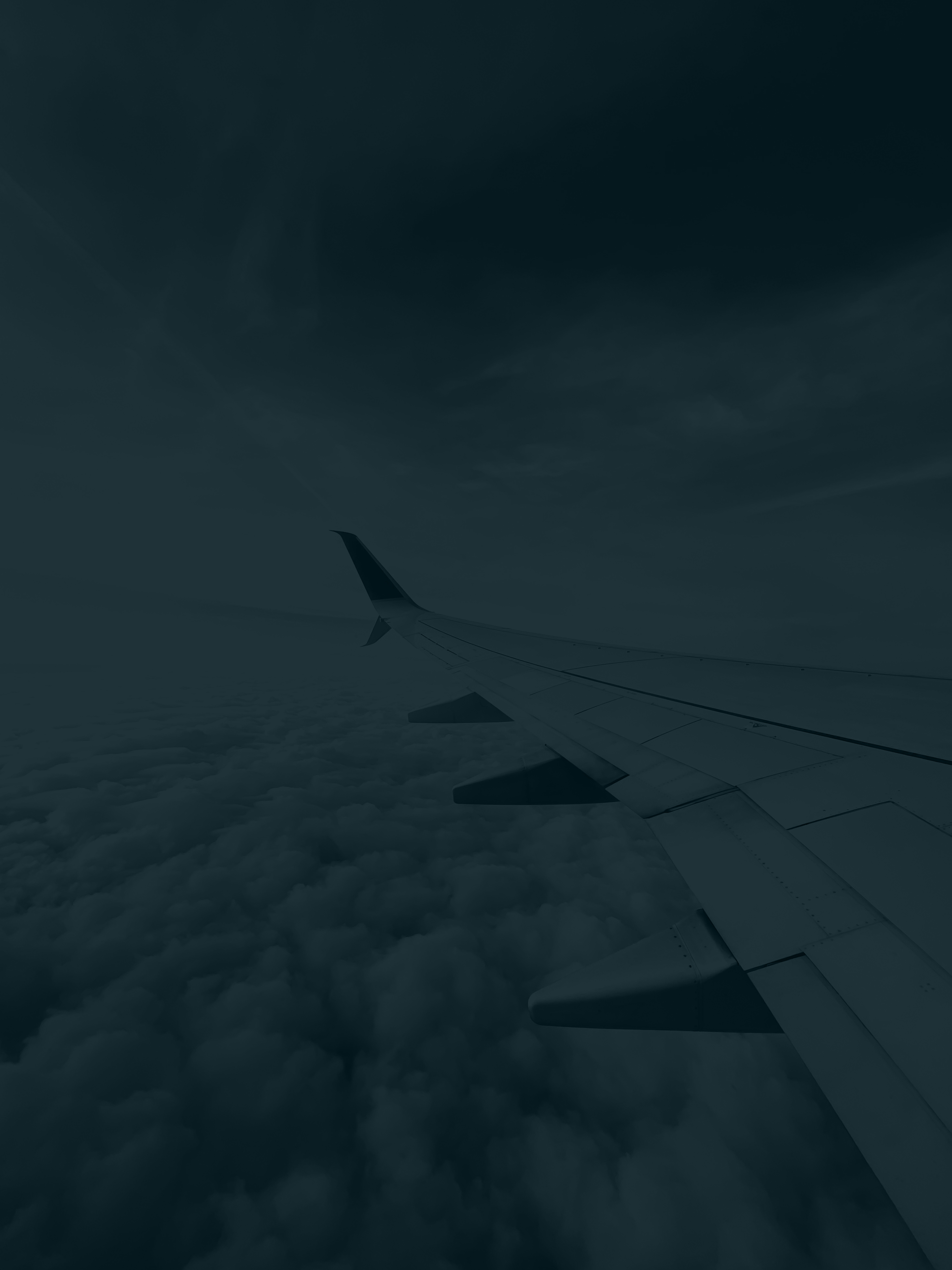 Business traveler in airport — corporate travel management company (TMC) guide